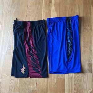 2 pairs of youth large under Armour shorts.